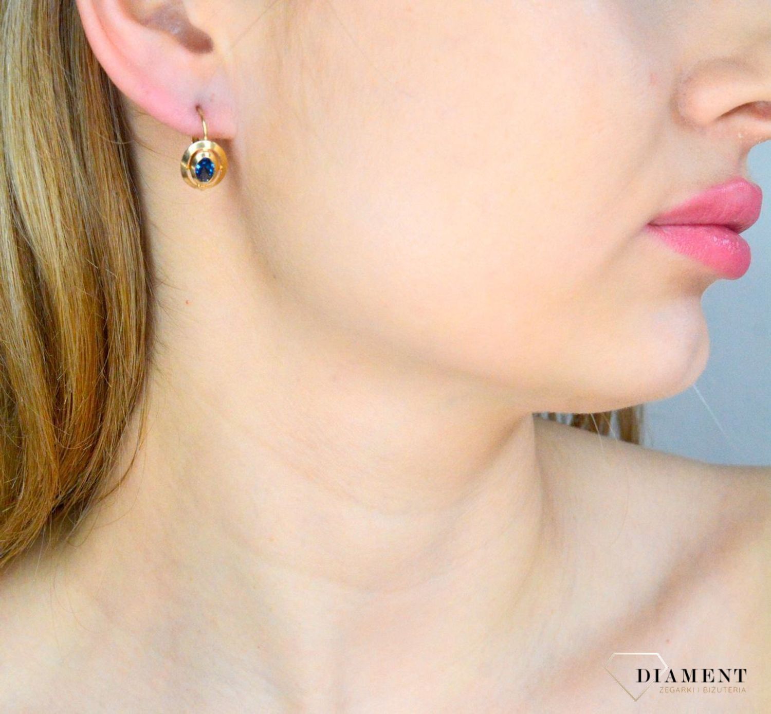 Złote kolczyki damskie 585 owalne z błękitną cyrkonią KL 10168C.jpg